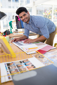 Graphic designer working at his desk