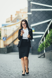 Young businesswoman on her phone