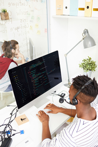 Man writing code on a computer